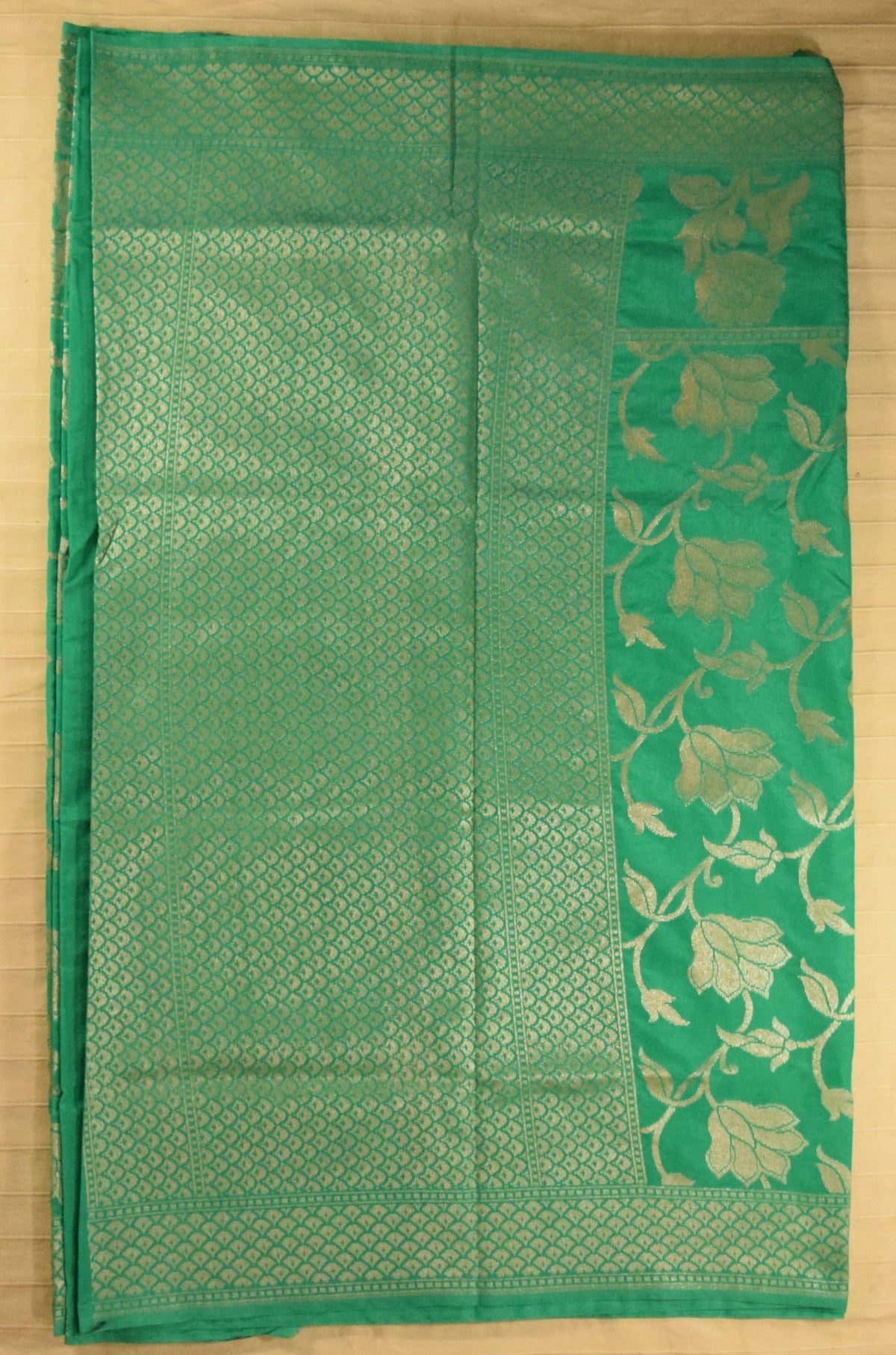 Luminous Emerald Green Floral Jaal Semi Banarasi Silk Saree