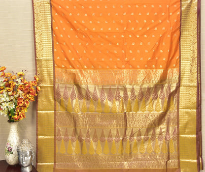 Radiant Orange Soft Silk Saree with Traditional Zari Elegance