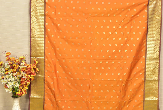 Radiant Orange Soft Silk Saree with Traditional Zari Elegance