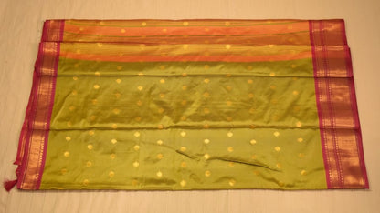 Elegant green Soft Silk Saree with golden motifs and pink border